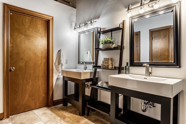 full bath featuring two sinks