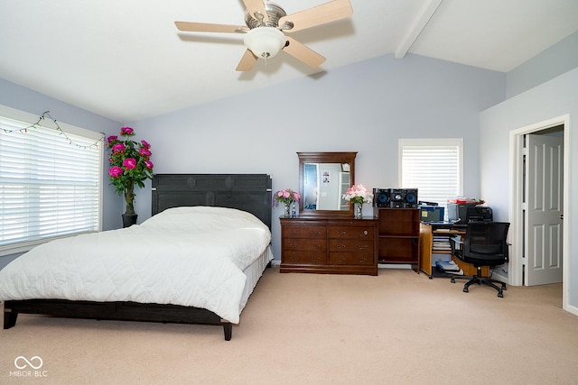 bedroom with vaulted ceiling with beams, ceiling fan, and light carpet