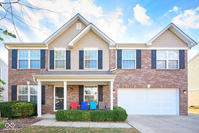 view of front of house with driveway, an attached garage, a porch, and brick siding