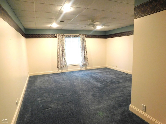 1229 E Tara Rd, Greensburg, IN 47240 - empty room featuring carpet, a ceiling fan, and a drop ceiling