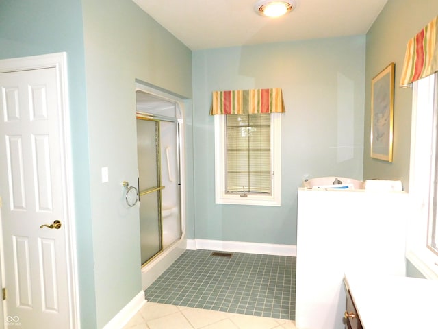 1229 E Tara Rd, Greensburg, IN 47240 - full bath featuring vanity, a shower stall, and tile patterned flooring