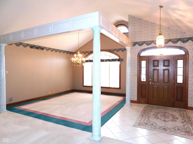 1229 E Tara Rd, Greensburg, IN 47240 - foyer entrance with vaulted ceiling, a chandelier, decorative columns, wallpapered walls, and tile patterned flooring