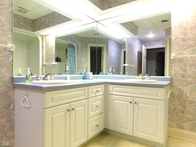 1229 E Tara Rd, Greensburg, IN 47240 - full bath featuring wallpapered walls, double vanity, and tile patterned floors