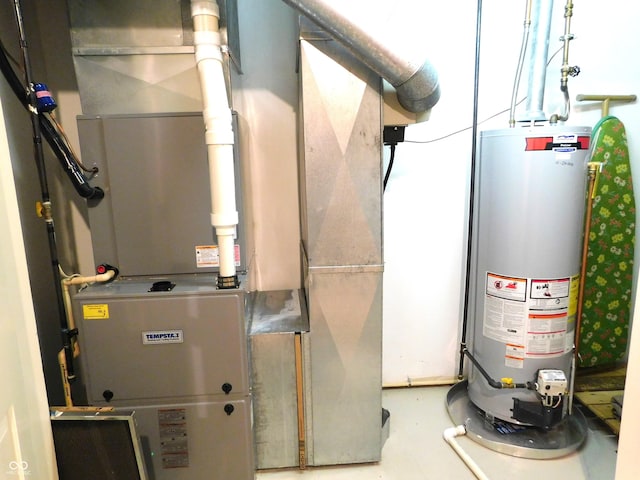 1229 E Tara Rd, Greensburg, IN 47240 - utility room with gas water heater