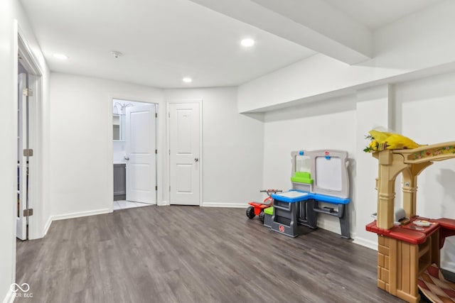 interior space with recessed lighting, baseboards, and wood finished floors