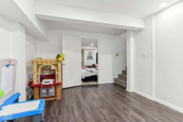 rec room with recessed lighting, wood finished floors, and baseboards