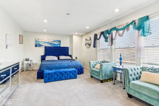 carpeted bedroom with baseboards and recessed lighting