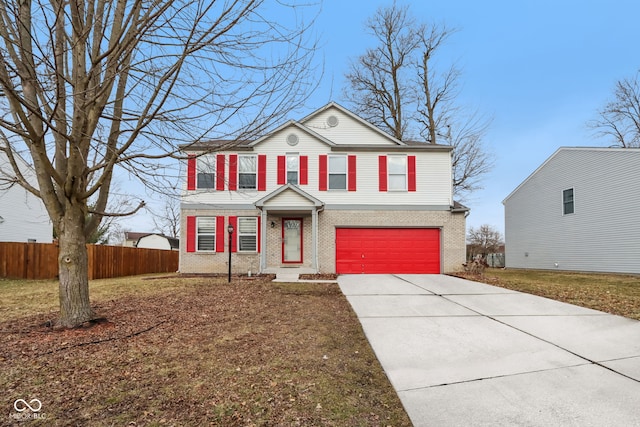 traditional-style home featuring a garage, brick siding, fence, and driveway