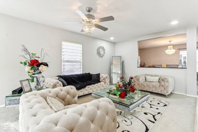 living room featuring a wealth of natural light, baseboards, carpet flooring, and recessed lighting