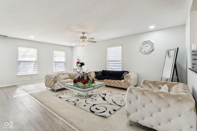 living room with ceiling fan, baseboards, wood finished floors, and recessed lighting