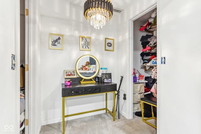 interior space featuring a notable chandelier and baseboards