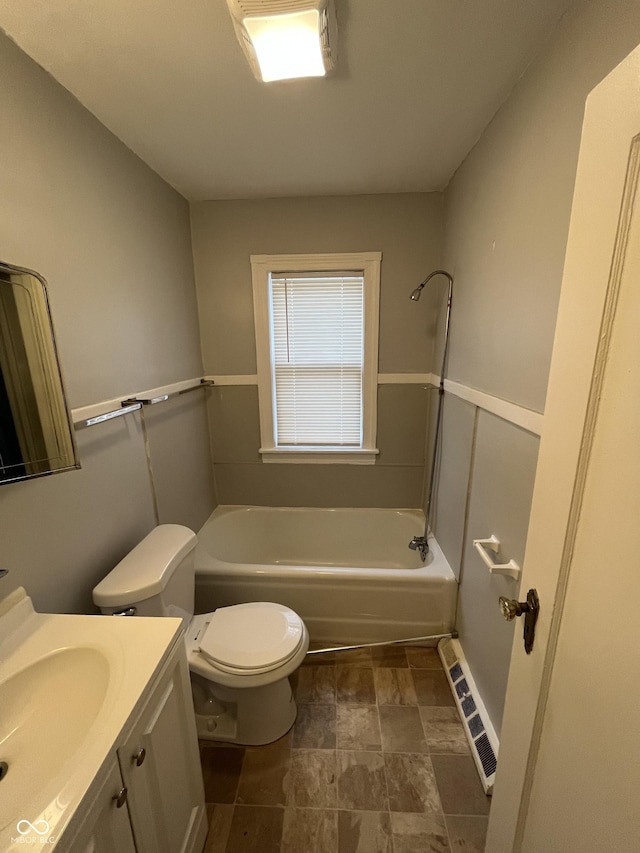 full bathroom with shower / washtub combination, toilet, and vanity