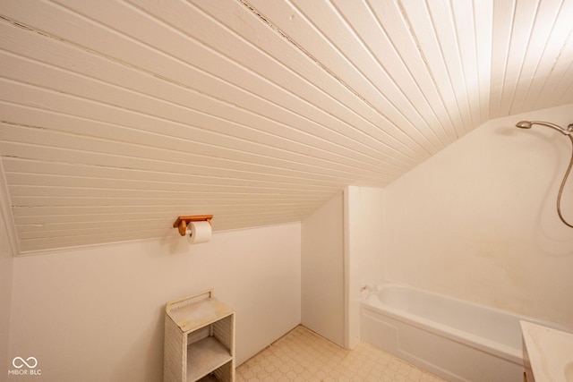 bathroom featuring shower / washtub combination, lofted ceiling, wooden ceiling, and tile patterned floors