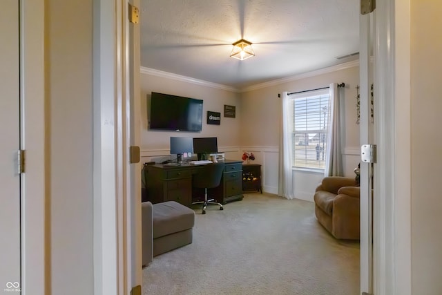 office featuring ornamental molding, a wainscoted wall, visible vents, and carpet floors