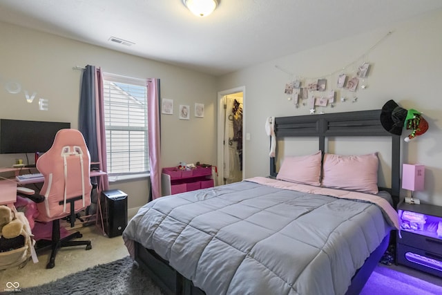 bedroom with carpet and visible vents