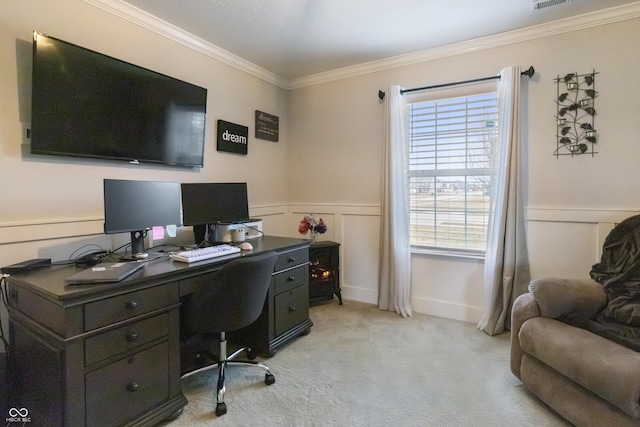 home office featuring ornamental molding, wainscoting, light colored carpet, and a decorative wall