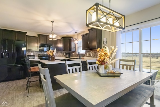 dining space with a chandelier