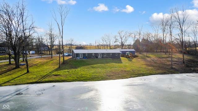 view of front of home with a front lawn