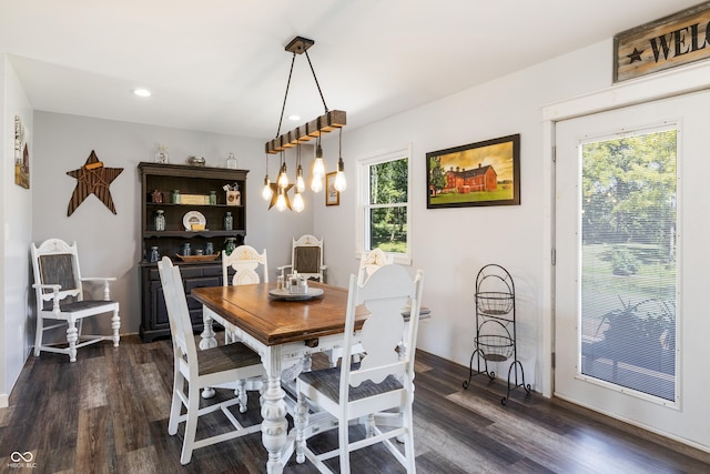 dining room with recessed lighting, dark wood finished floors, and a healthy amount of sunlight