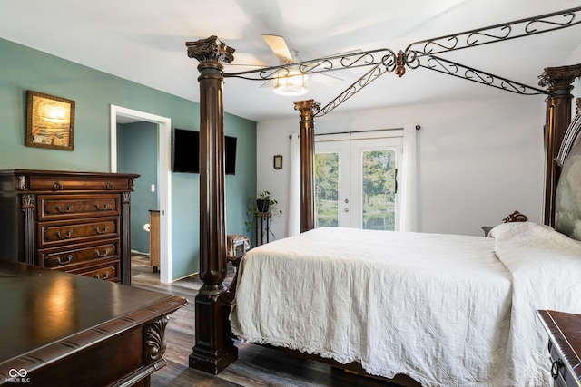 bedroom with access to exterior, dark wood-type flooring, and french doors