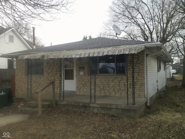 view of front of house with stone siding