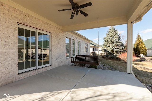 view of patio featuring a ceiling fan