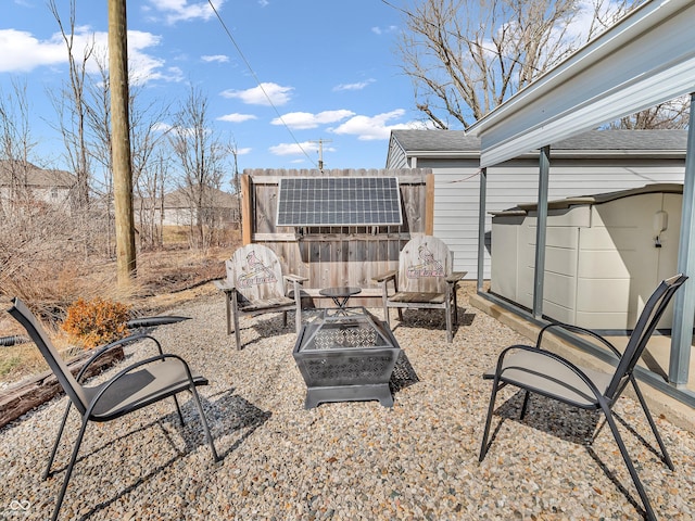 view of patio / terrace with an outdoor fire pit