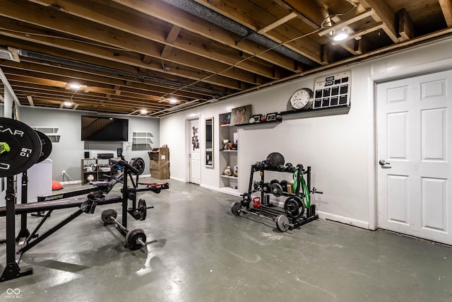 exercise room with baseboards