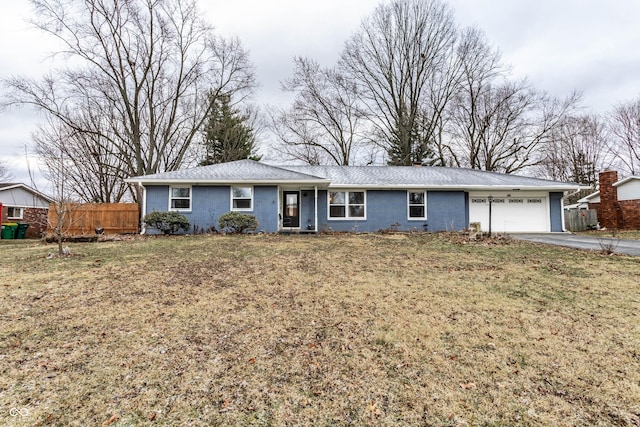 ranch-style home featuring a garage, brick siding, fence, and aphalt driveway