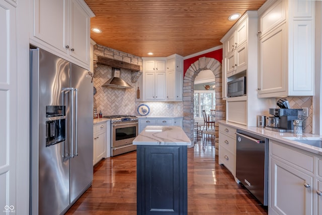 kitchen featuring wooden ceiling, dark wood-style floors, and stainless steel appliances