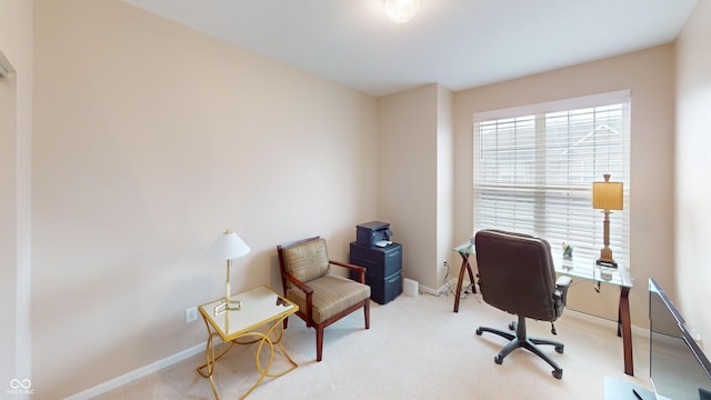 home office with baseboards and carpet