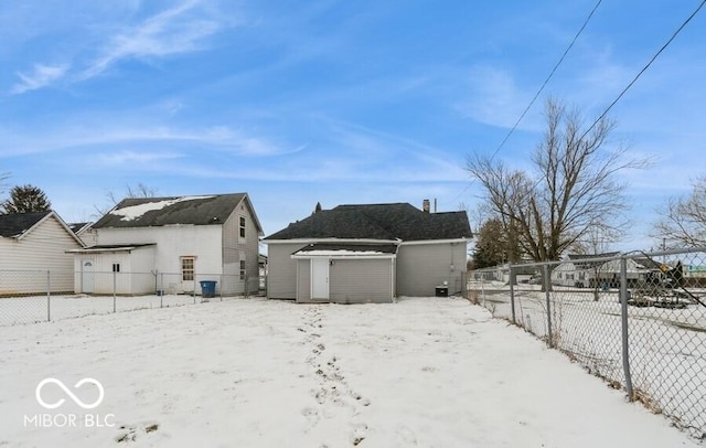 exterior space with a shed, an outdoor structure, and a fenced backyard