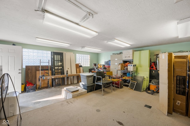 interior space featuring a wealth of natural light and a textured ceiling