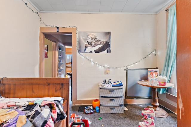 bedroom featuring carpet and crown molding