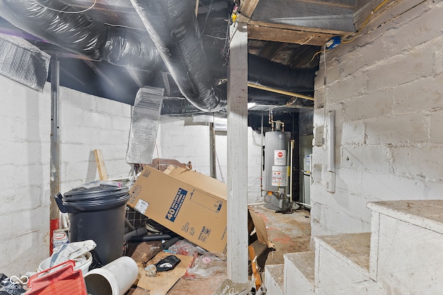 unfinished below grade area featuring gas water heater