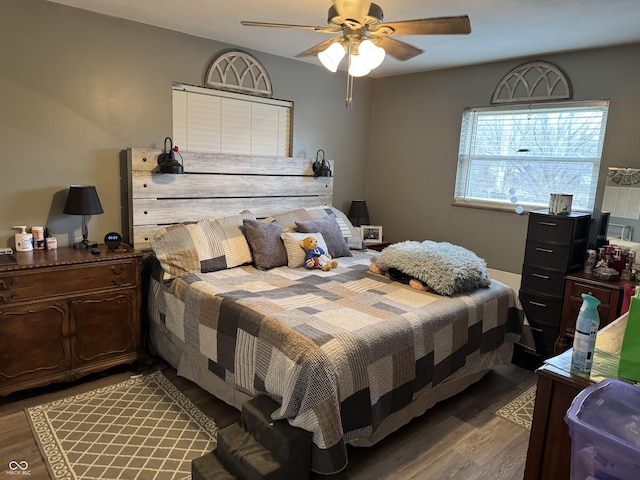 bedroom featuring ceiling fan and wood finished floors