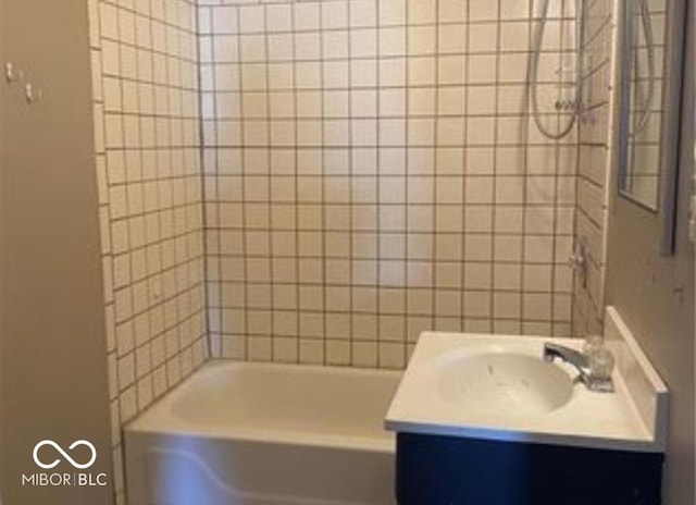 full bathroom featuring shower / bathing tub combination and vanity