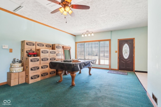 interior space featuring visible vents, pool table, baseboards, ceiling fan, and a textured ceiling