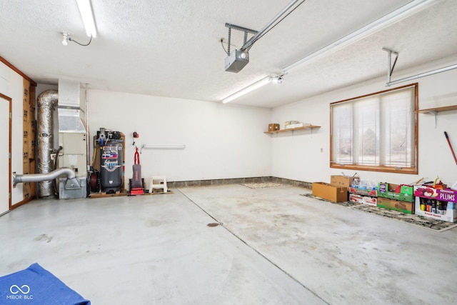 garage with a garage door opener and water heater