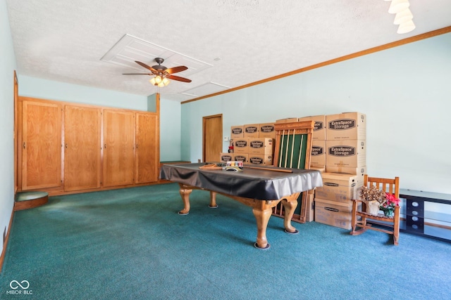 playroom featuring ornamental molding, a ceiling fan, a textured ceiling, carpet floors, and pool table