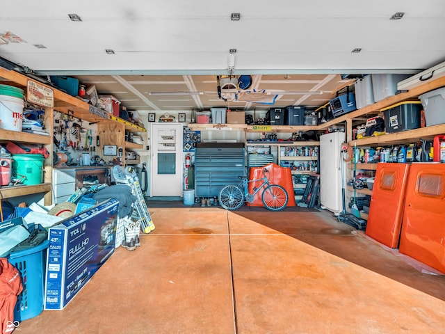 garage with a workshop area