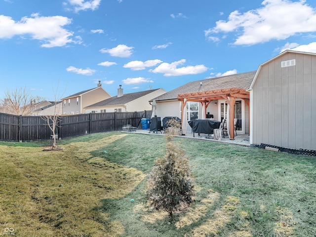 view of yard with a patio, a fenced backyard, and a pergola