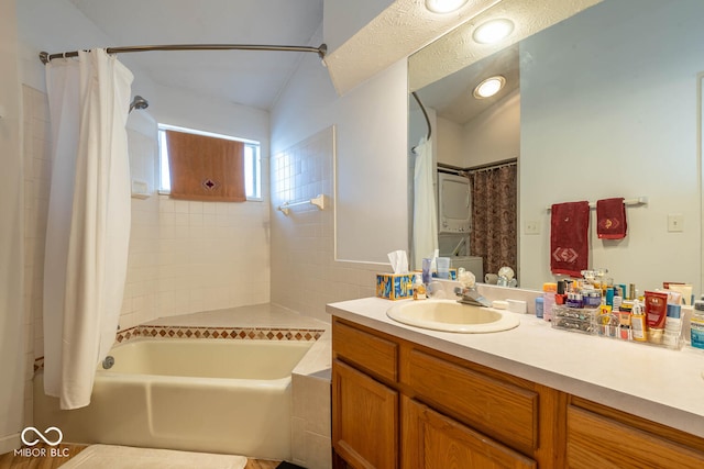 bathroom featuring vanity and shower / bathtub combination with curtain