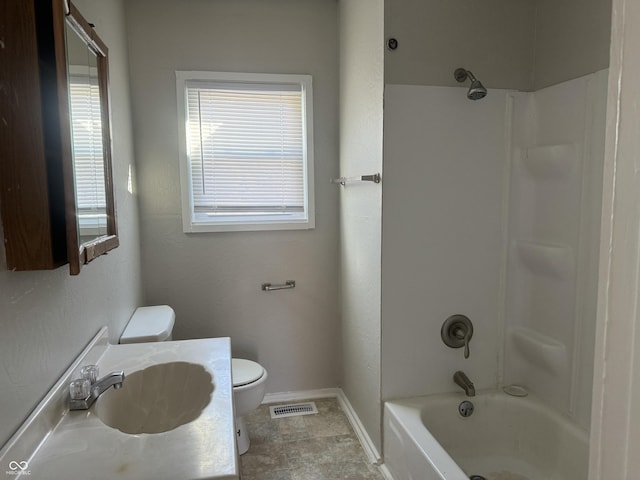 full bathroom featuring toilet, shower / bath combination, vanity, visible vents, and baseboards