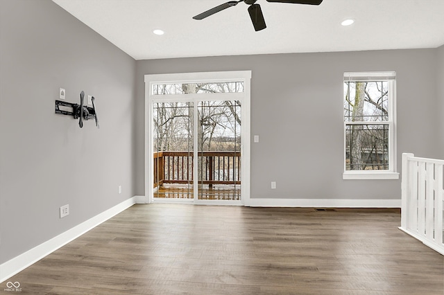 interior space featuring ceiling fan, recessed lighting, wood finished floors, and baseboards