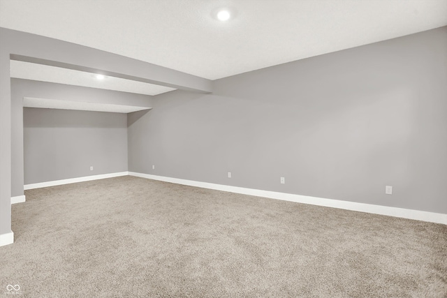 finished basement with carpet flooring and baseboards