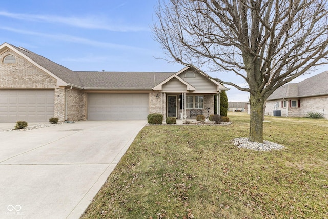 view of front of property with an attached garage, brick siding, driveway, roof with shingles, and a front lawn