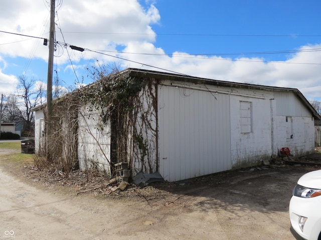 view of property exterior featuring an outdoor structure