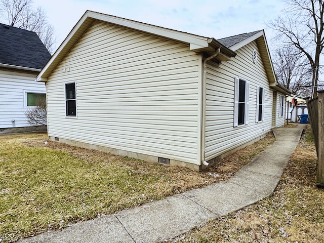 view of property exterior featuring crawl space