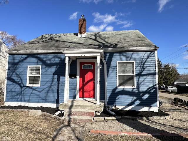 view of front of property with a chimney